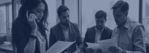 Image of 4 people discussing about a project